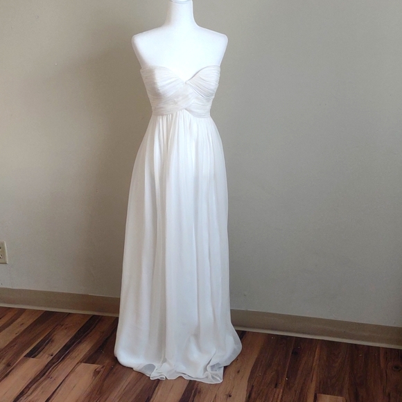 Donna Morgan Dresses & Skirts - Donna Morgan white silk/polyester strapless maxi dress.  Size 10